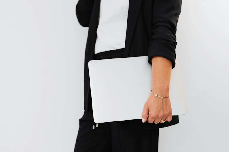 detail of woman holding a folder